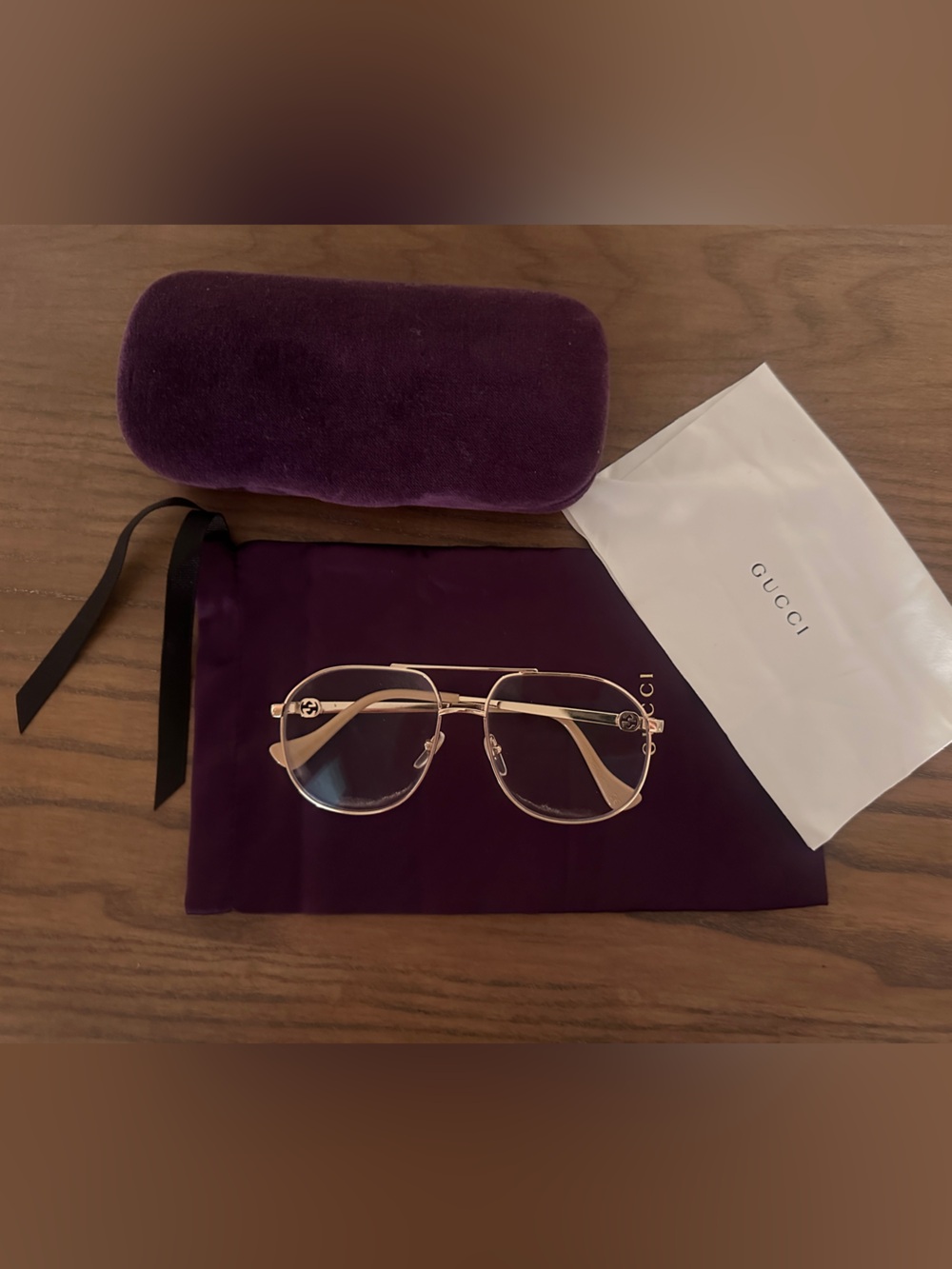 Gucci Women’s Gold Frame Glasses